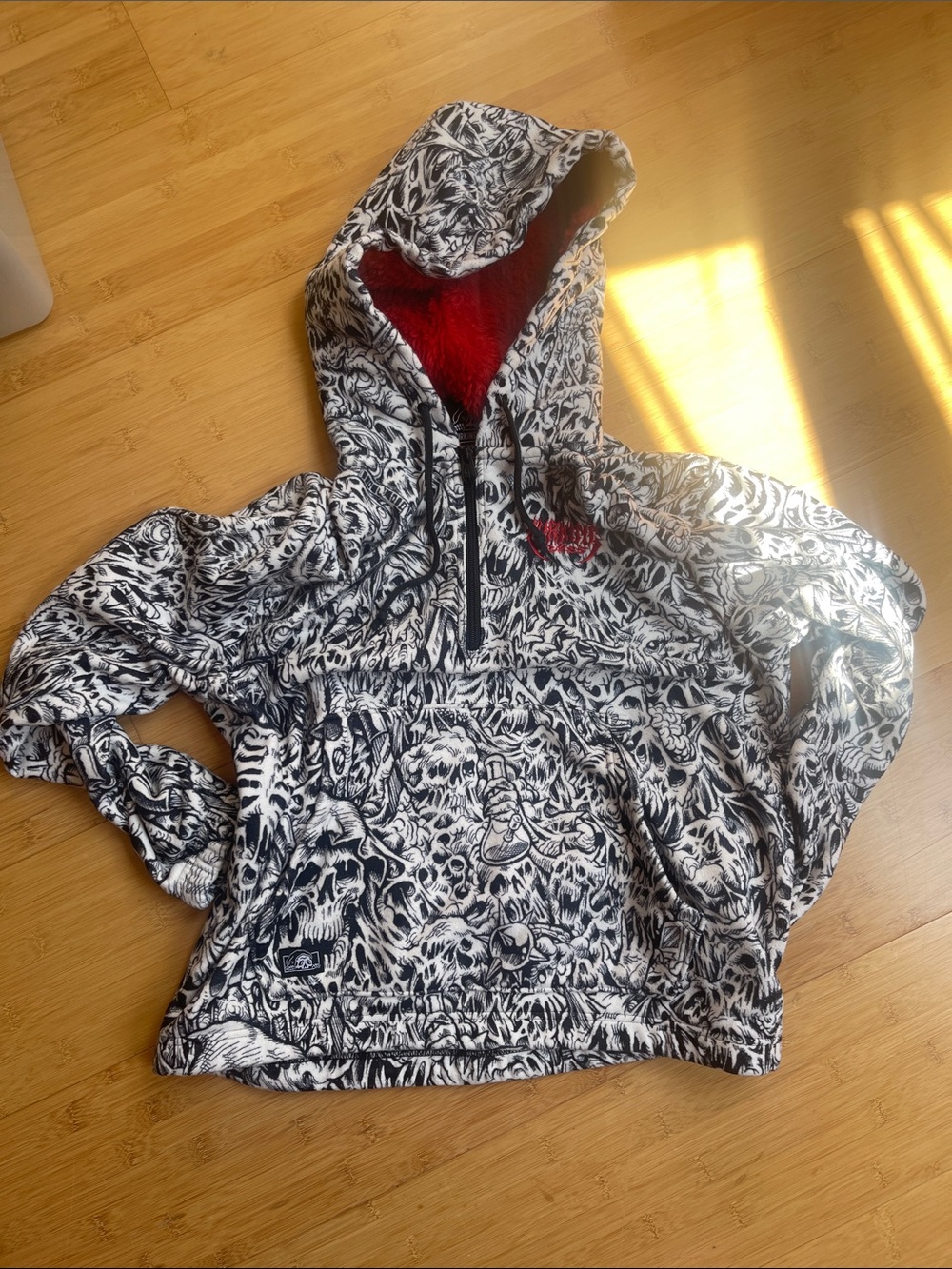 Black & White Graphic Pullover Hoodie with Red Hood Lining